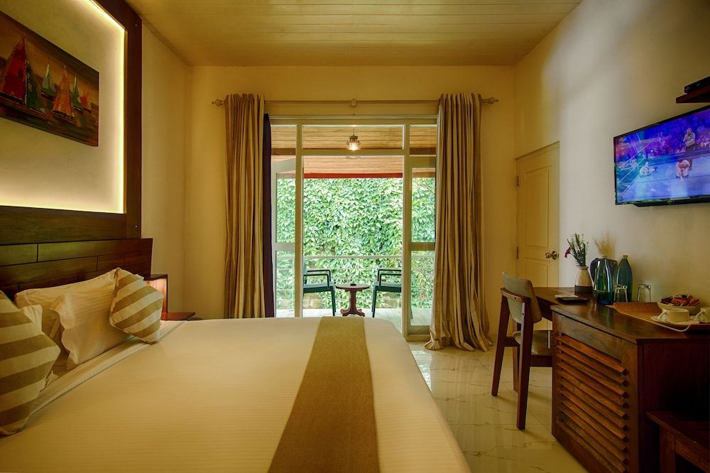 Deltora Boutique Hotel Deluxe Double Room, 1 King Bed, Non Smoking, Garden View 4