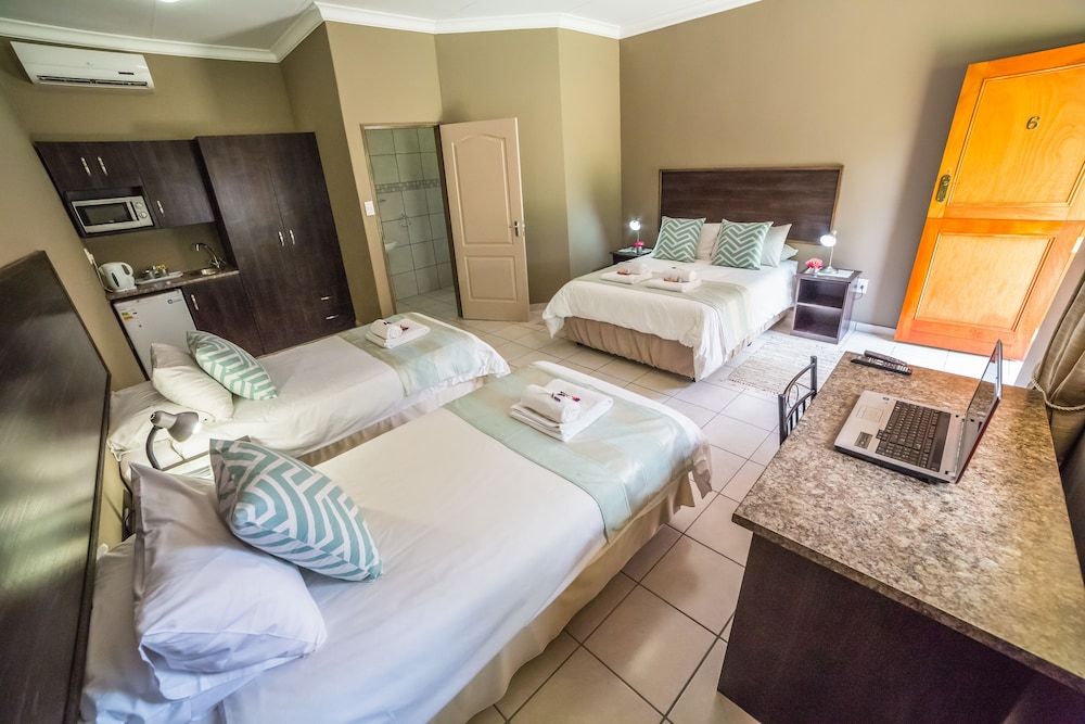 Beryl1 Guest House Family Room, Multiple Beds, Non Smoking, Garden View 4