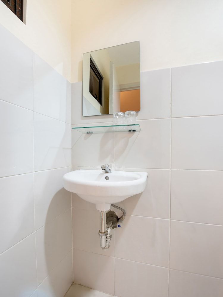 OYO 490 V-cat Apartelle Deluxe Double Room 16