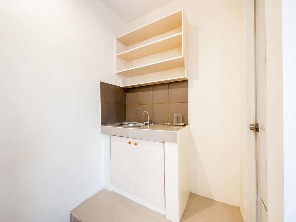 OYO 490 V-cat Apartelle Deluxe Double Room 17