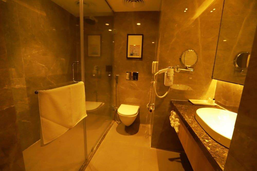 Grand Sarovar Portico Deluxe Twin Room 3