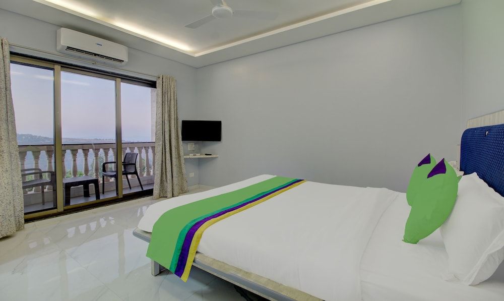 Treebo Trend Jeevan Village Deluxe Double Room