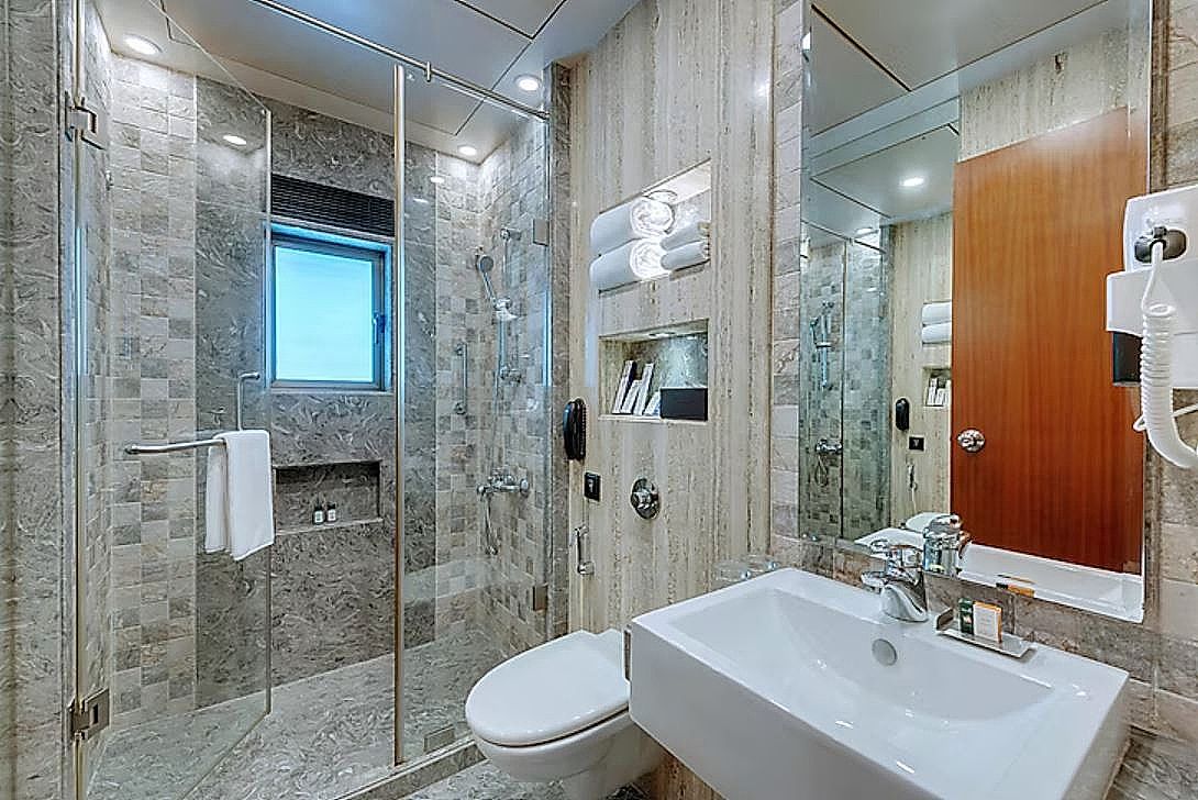 Adiva Residency Beacon Deluxe Room 4