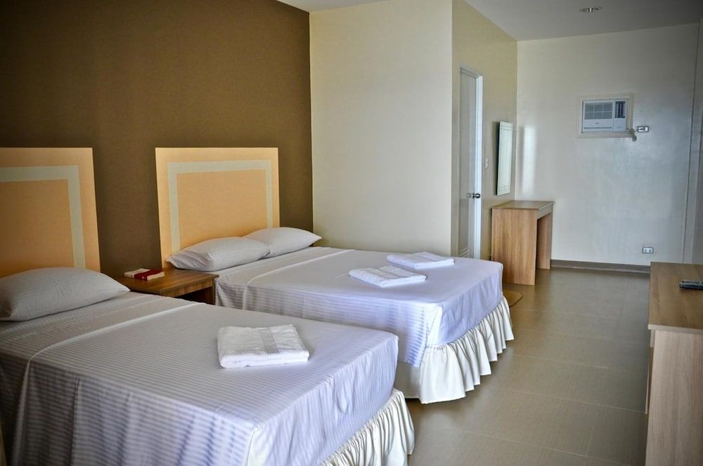 Matutinao Beach Triple Room with Private Bathroom 2