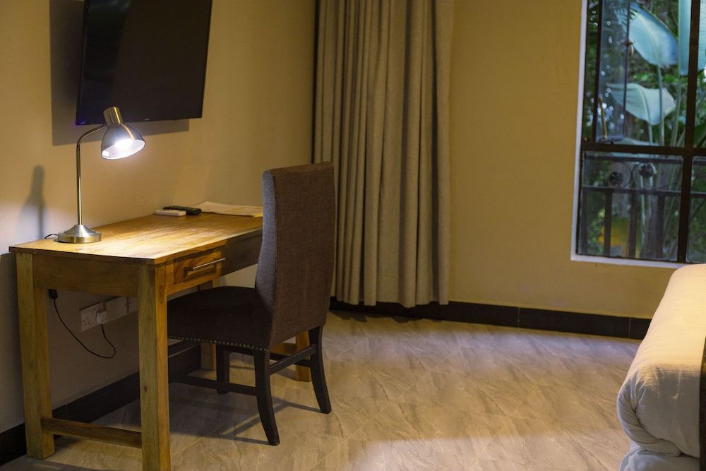 Malkia Trees Lodge Deluxe Triple Room 14