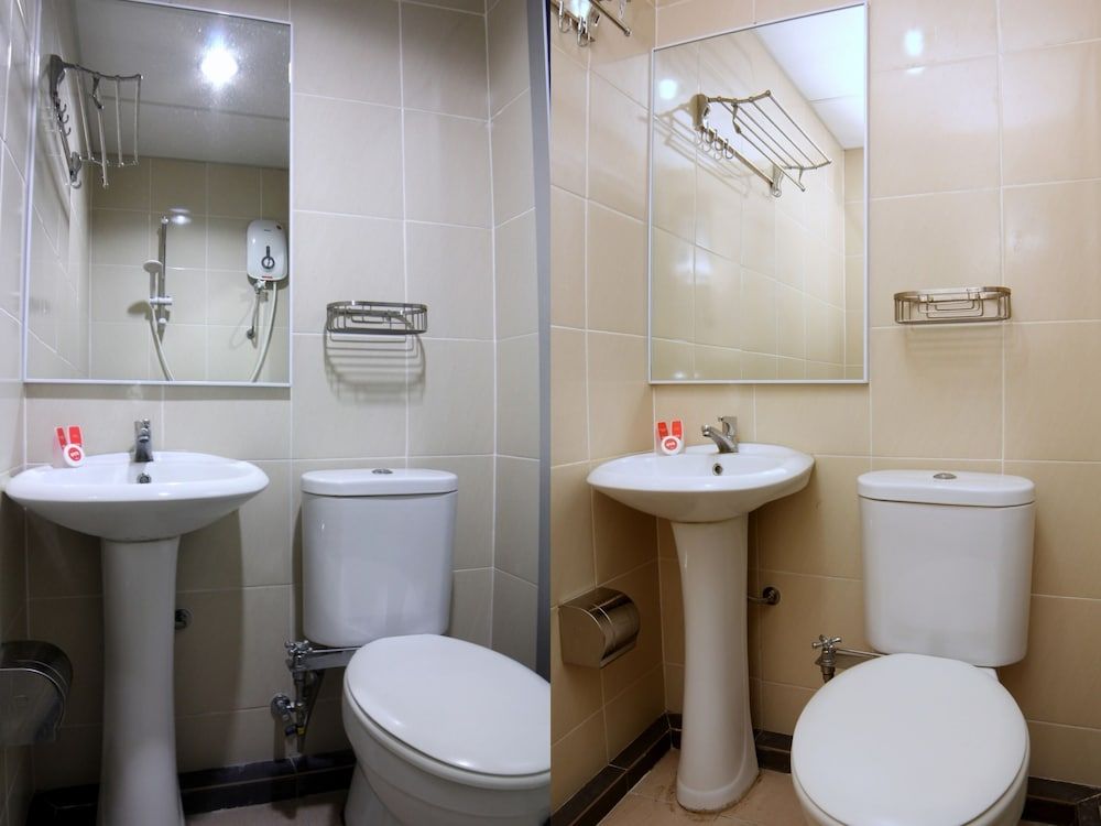 OYO 44054 Holiday Mansion Inn Standard Double Room, 1 Queen Bed 4