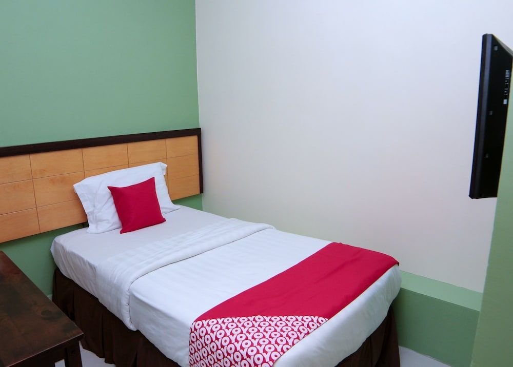 OYO 44054 Holiday Mansion Inn Standard Single Room 2