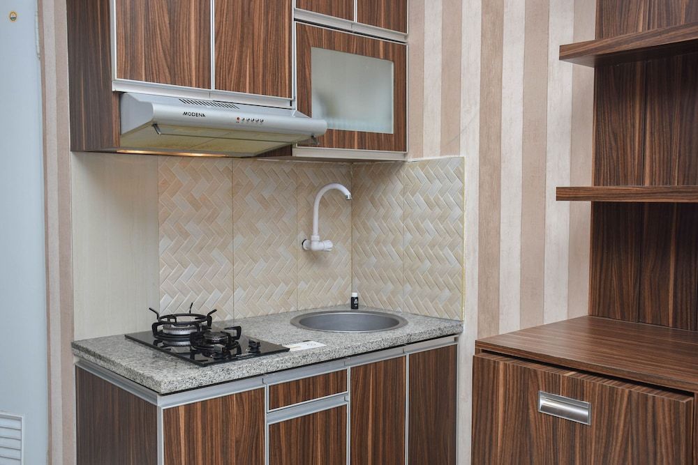 undefined Cozy and Comfort Living Studio at Green Pramuka City Apartment 7