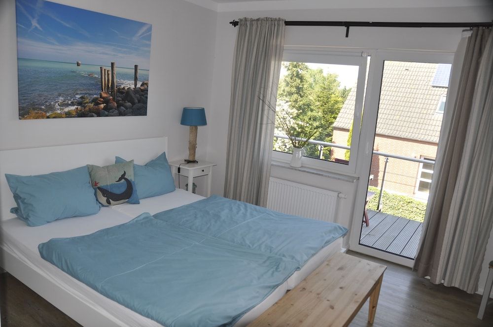 Hus Seeblick Double Room, 1 King Bed, Balcony, Garden View 3