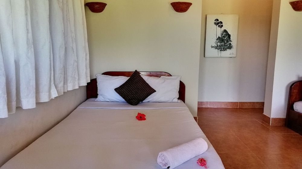 Q Bungalows Deluxe Quadruple Room, 2 Double Beds, Garden View 6