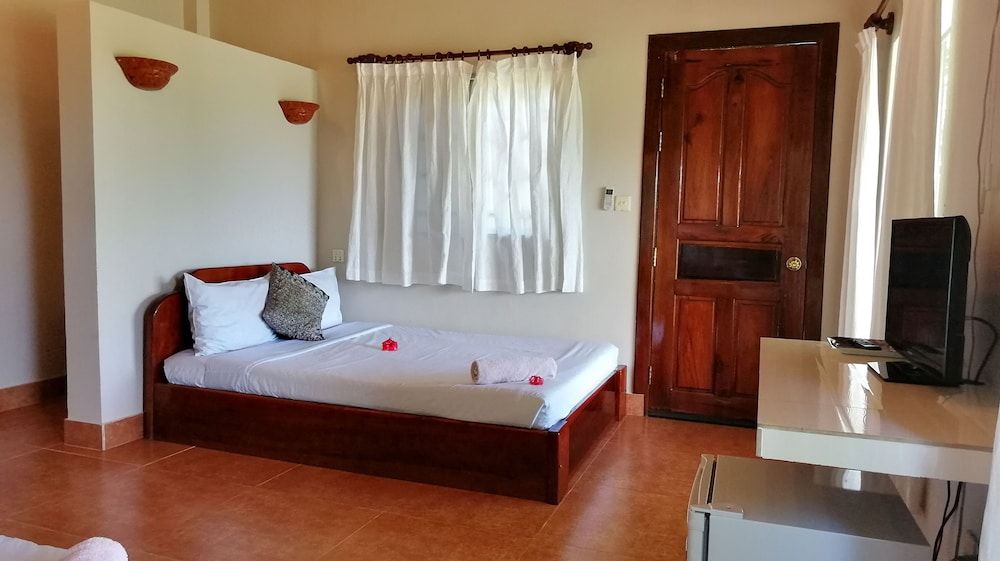 Q Bungalows Deluxe Quadruple Room, 2 Double Beds, Garden View 7
