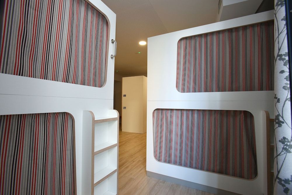 dpaso Urban Hostel Single bed in  20 beds shared dormitory, shared bathroom 9