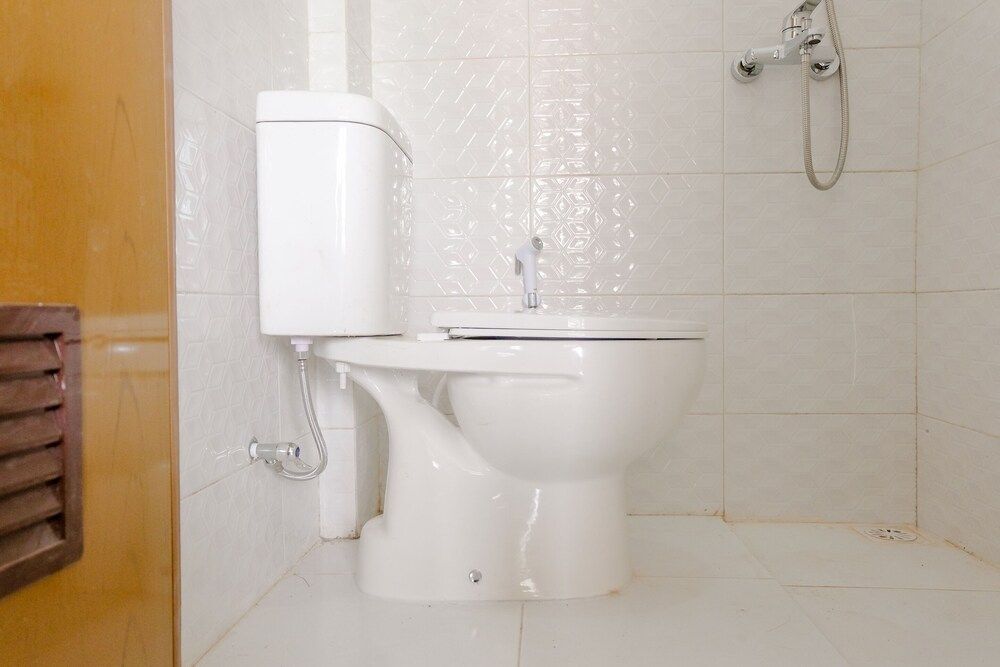 Super OYO 1376 Kina Family Residence Syariah Standard Double Room 17