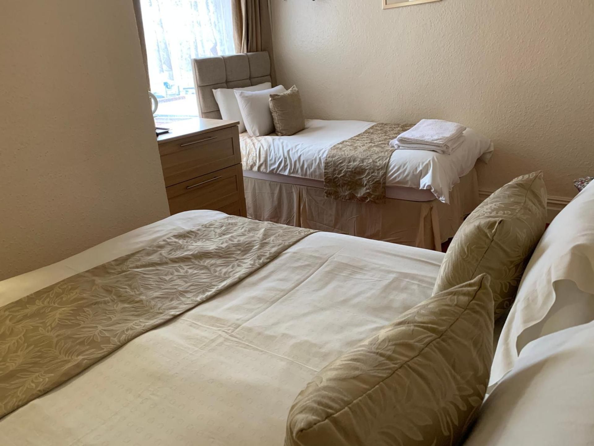 Triple Room with Shared Bathroom