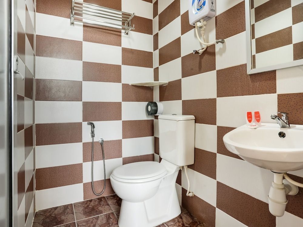 OYO 89583 Grove Hotel Family Suite 4