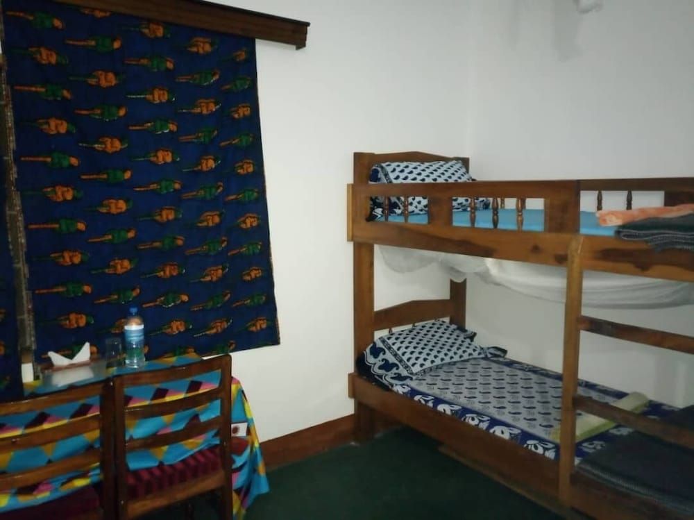 Shared Dormitory (For Men: 3 Bunk Beds & 1 Single bed)
