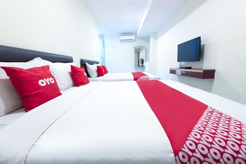 OYO 90385 H3 Hotel Family Suite 2