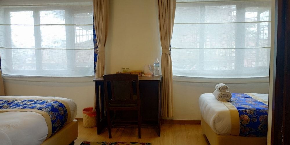 Heranya La:Ku Deluxe Triple Room, Multiple Beds, Courtyard View 4