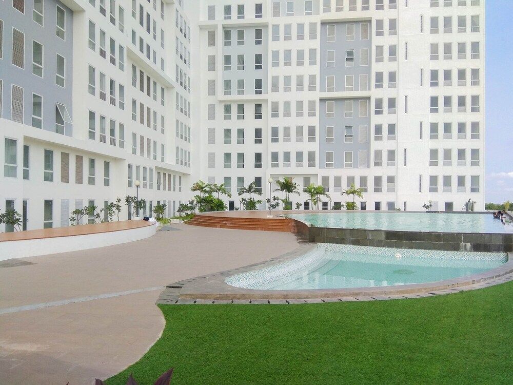 Comfortable Patraland Urbano Studio Apartment Near Train Station