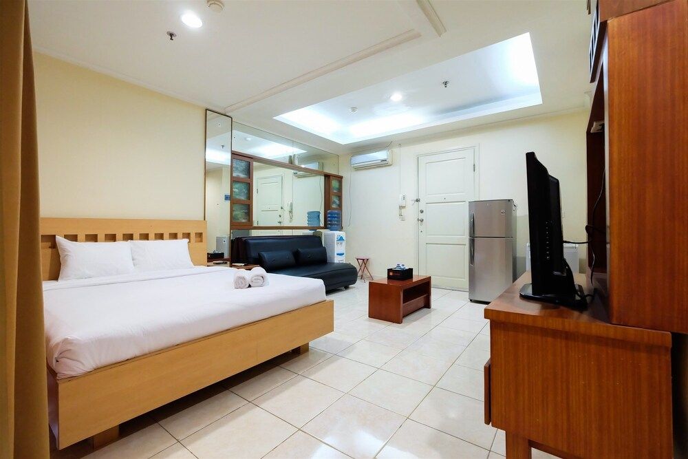 undefined Simply Spacious Studio Room at City Home Apartment near Kelapa Gading