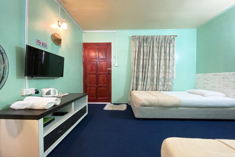 OYO Home 90285 Pogimpaan Homestay Twin Room, Private Bathroom 3