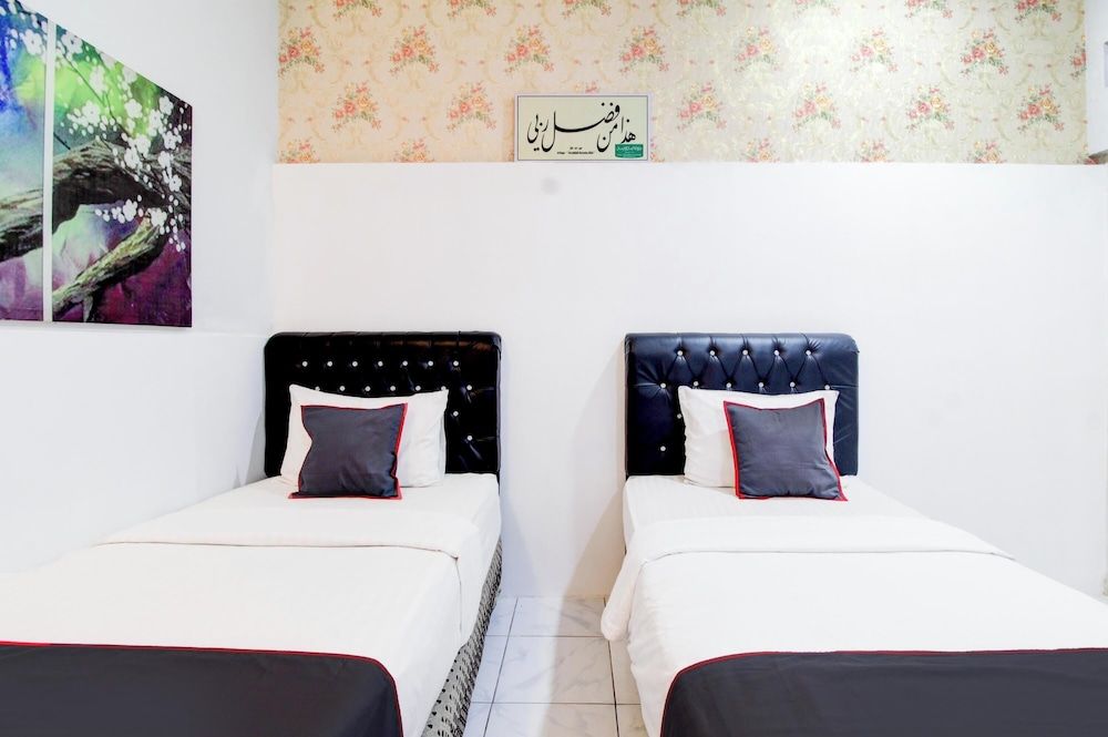 Hotel O Jalan Jenderal Sudirman Near Imam Bonjol Square Formerly Nelvi Guest House Deluxe Twin Room, 2 Twin Beds, Non Smoking 2