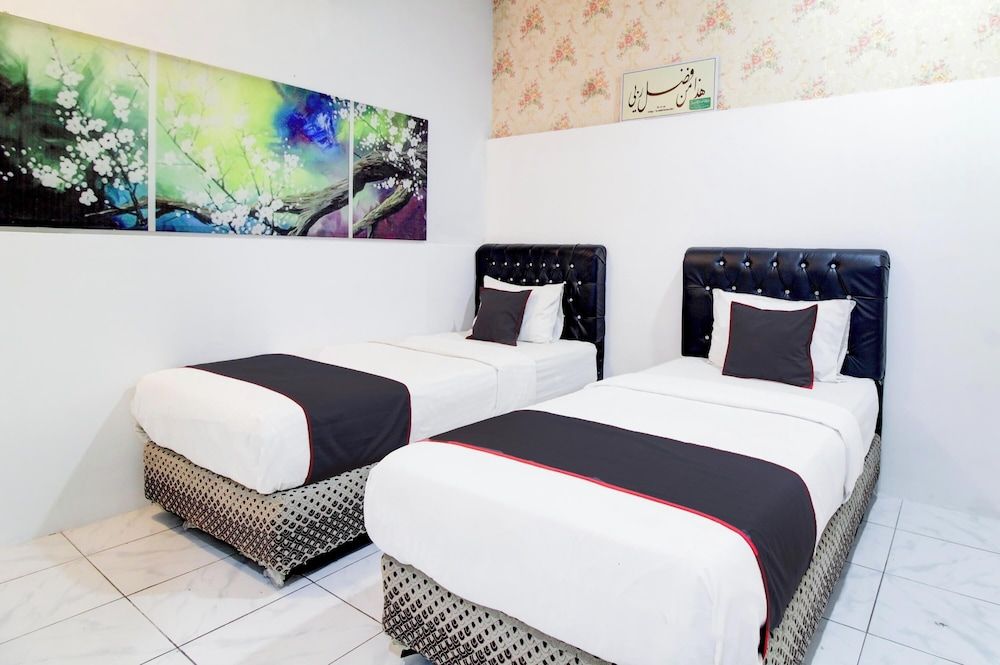 Hotel O Jalan Jenderal Sudirman Near Imam Bonjol Square Formerly Nelvi Guest House Deluxe Twin Room, 2 Twin Beds, Non Smoking
