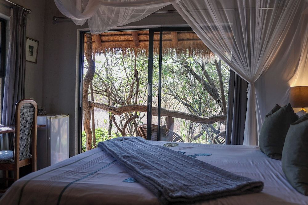 Call of the Wild Lodge Deluxe Room, Garden View 10