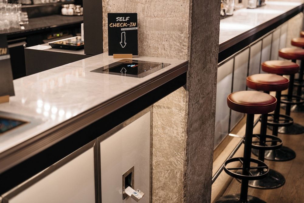 Check-in/check-out kiosk