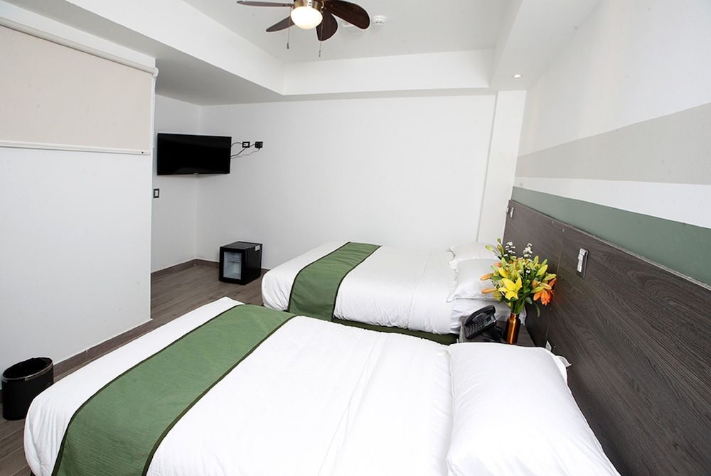 Hotel Cultura Plaza Deluxe Triple Room 2