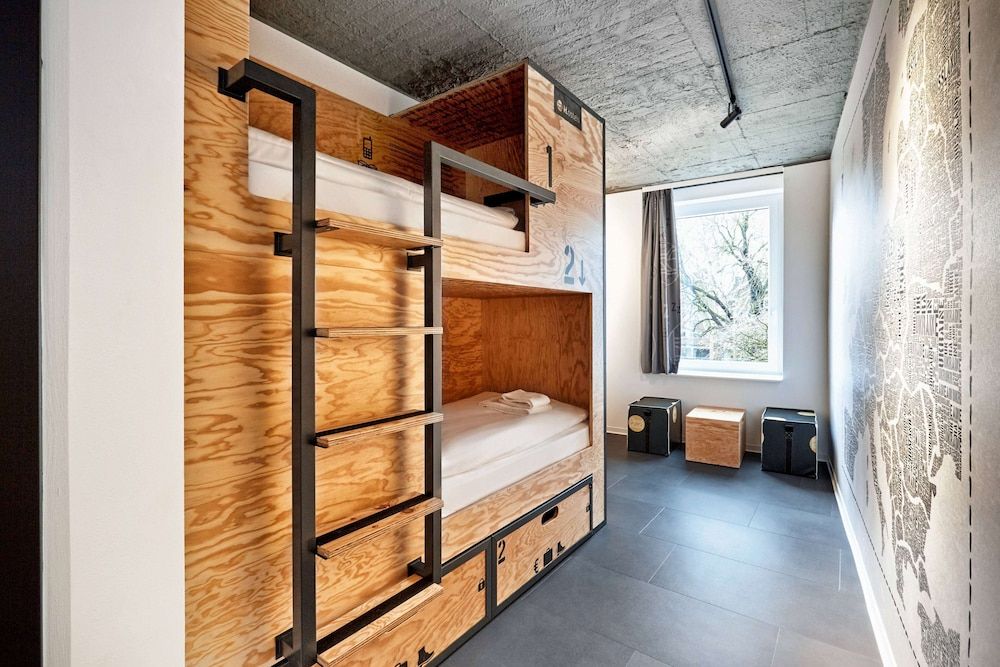 Bed in mixed double room with private bathroom