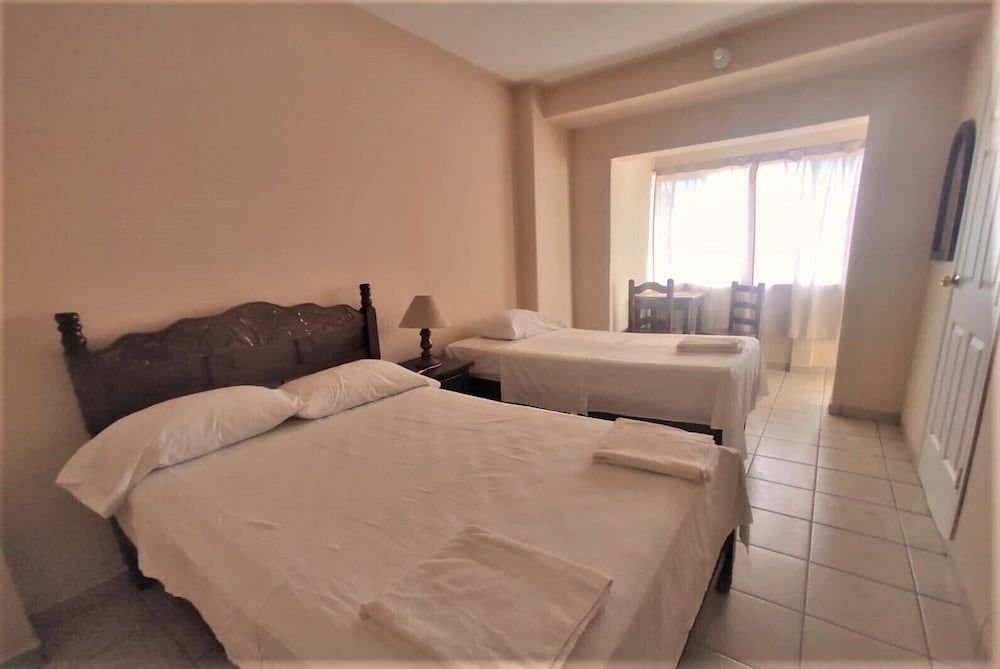 Traditional Triple Room (cruzando la calle)