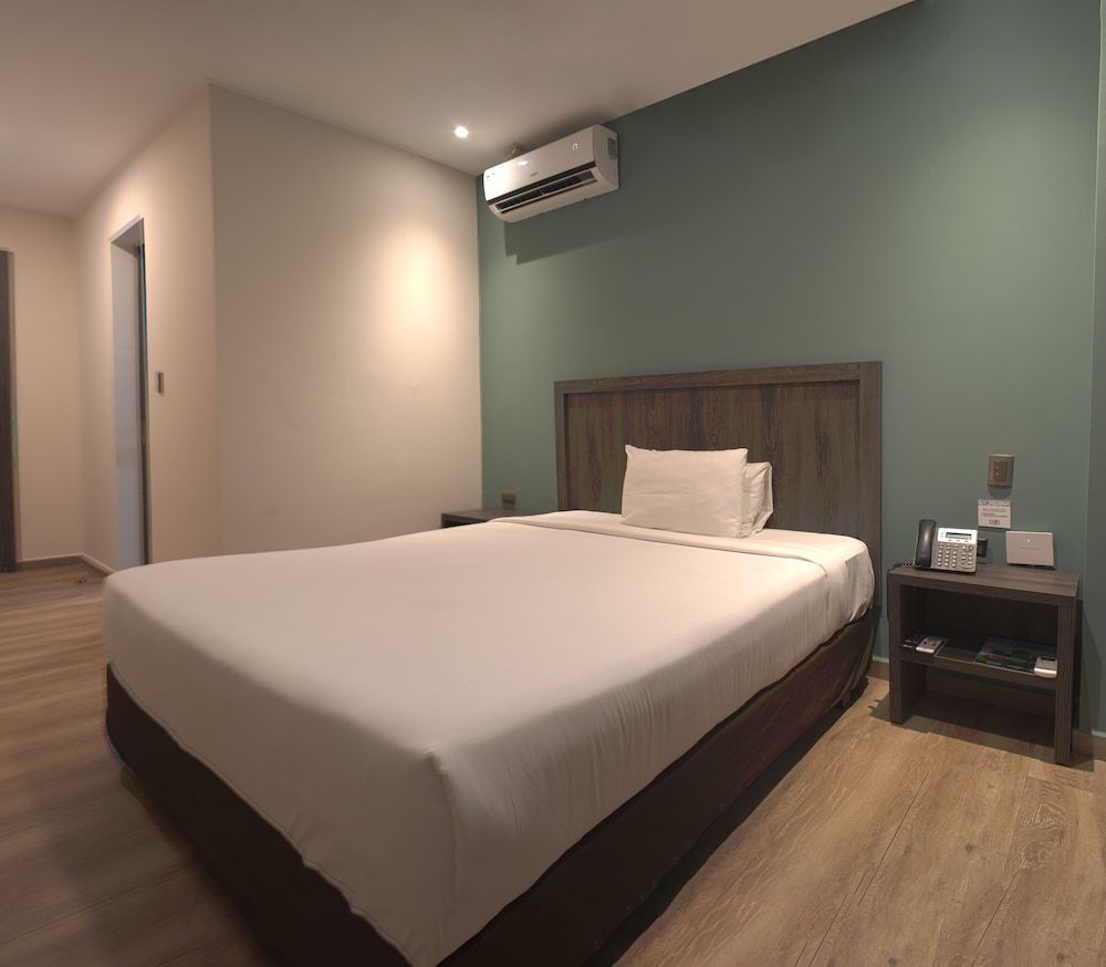 REEC Machala by Oro Verde Hotels Deluxe Queen 4