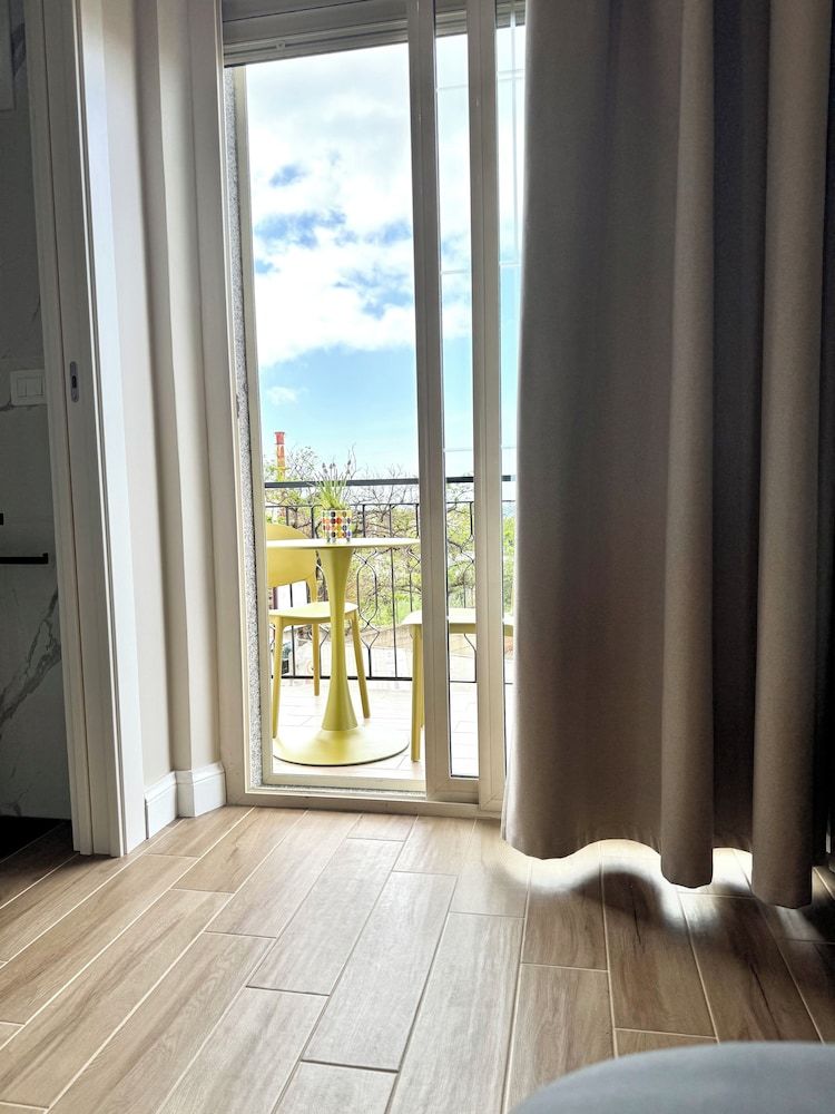 Charm Airport Superior Triple Room, Sea View 13