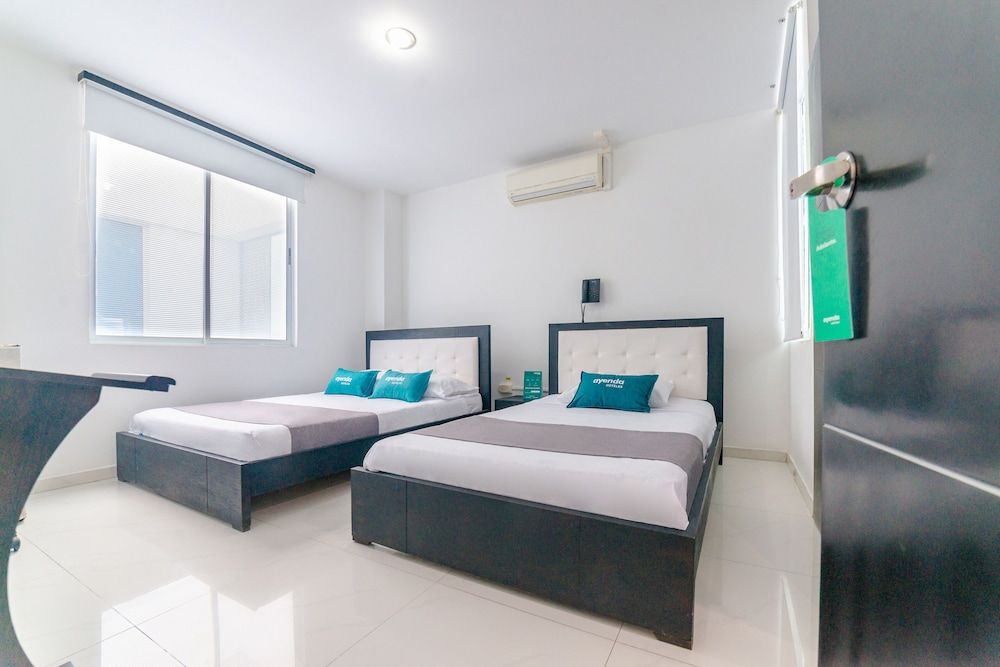 Ayenda Royal Fenix Standard Triple Room 2