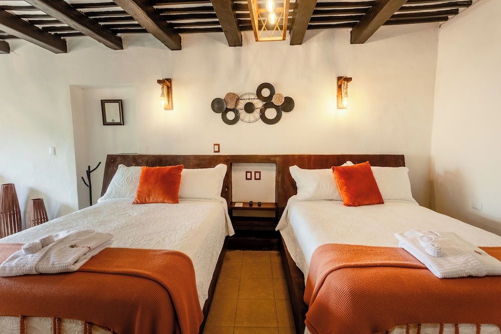 Kuxtal Hotel Boutique Deluxe Room, 1 King Bed, Refrigerator, Pool View