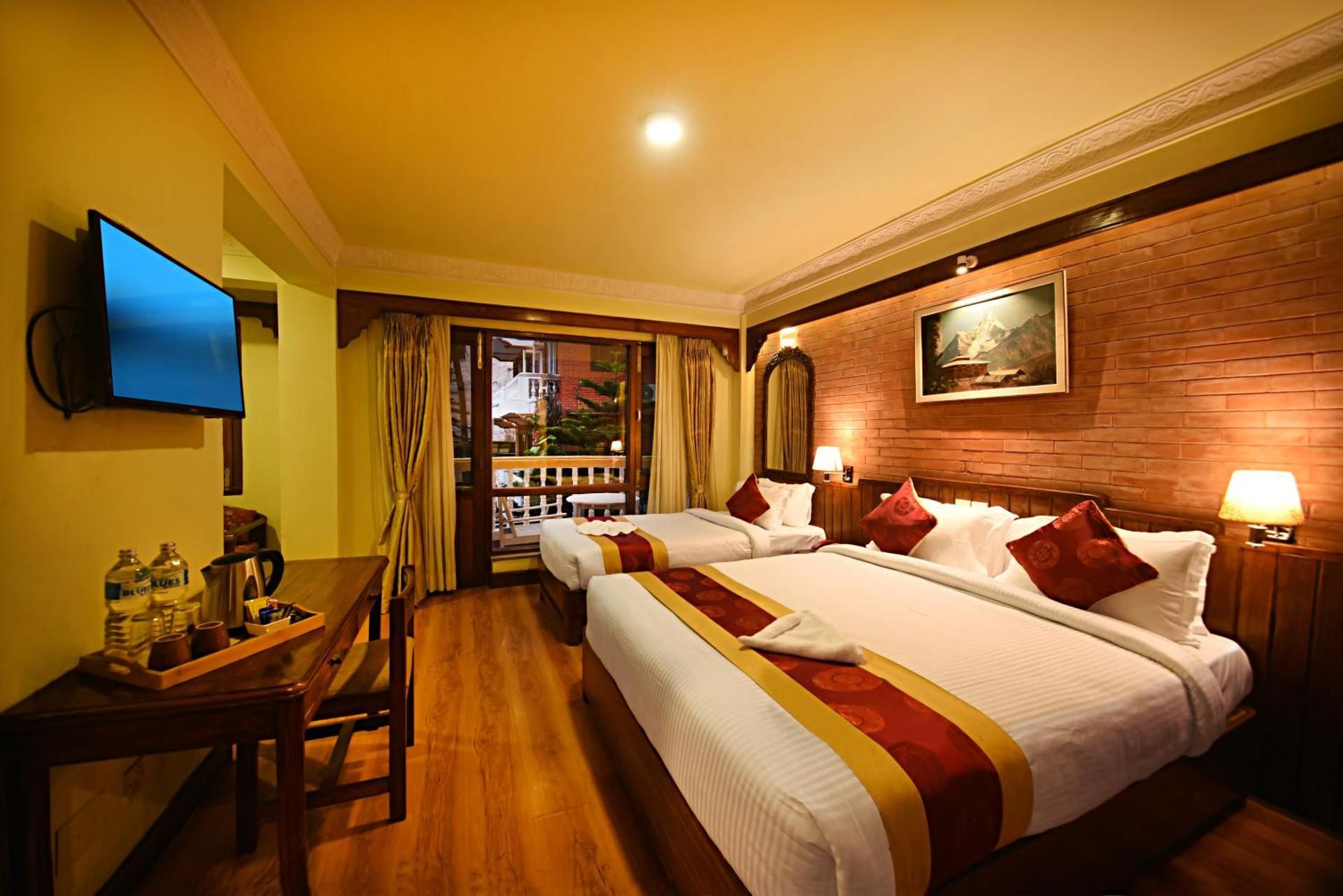 Nirvana Garden Hotel Family Room with Balcony