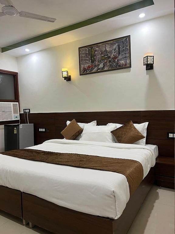 HR Grand Hotel Jasola by FMJ Homestead Deluxe Room