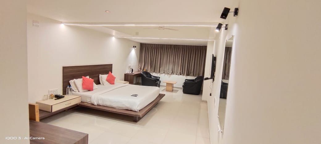 Infocity Club & Resort Deluxe Room 5