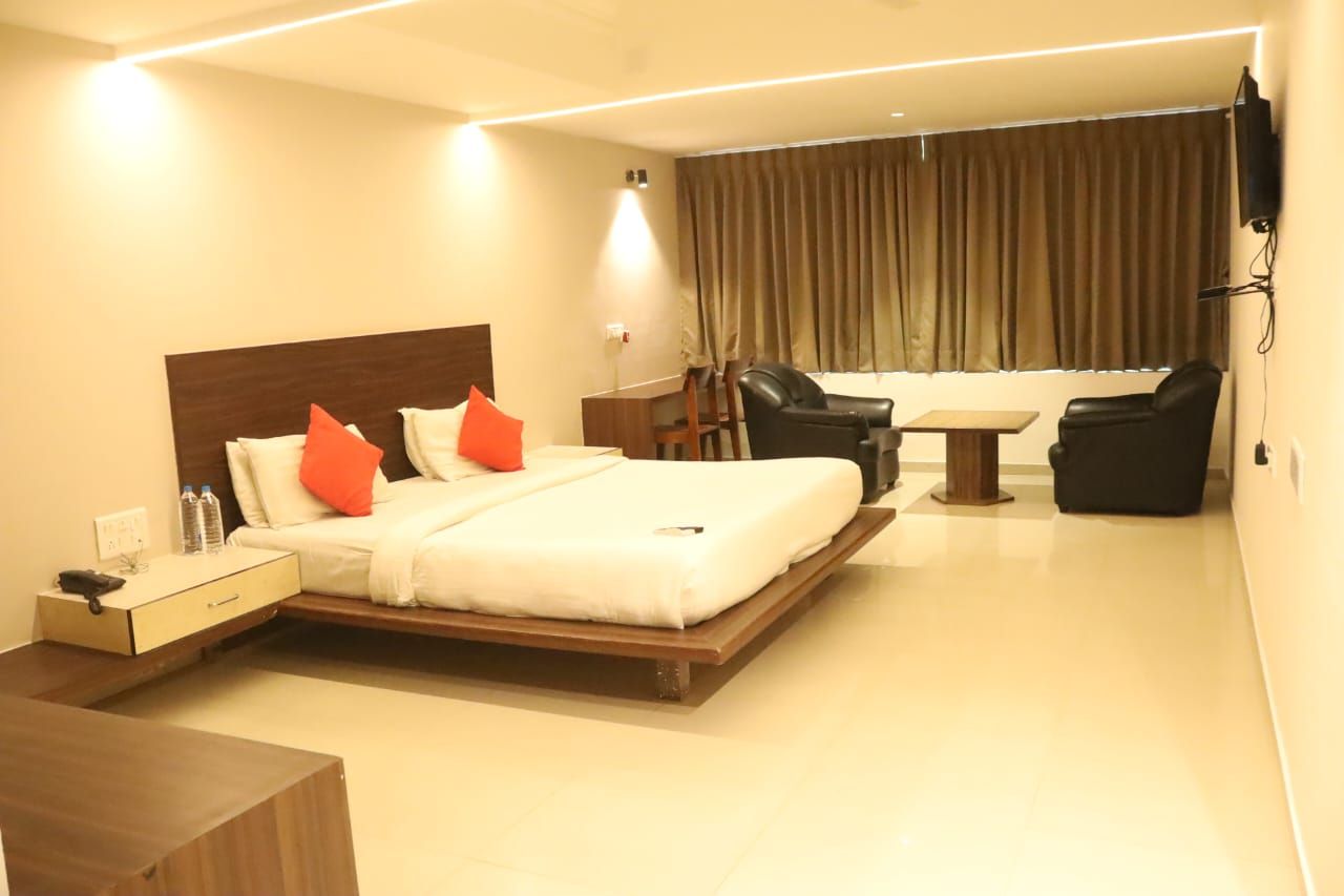 Infocity Club & Resort Deluxe Room 3
