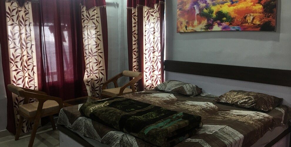 Double bed with attached washroom