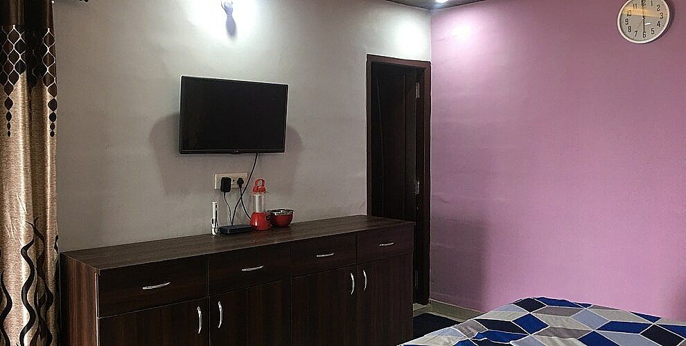 Double bed with attached washroom