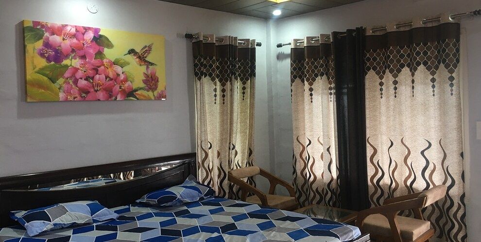 Double bed with attached washroom