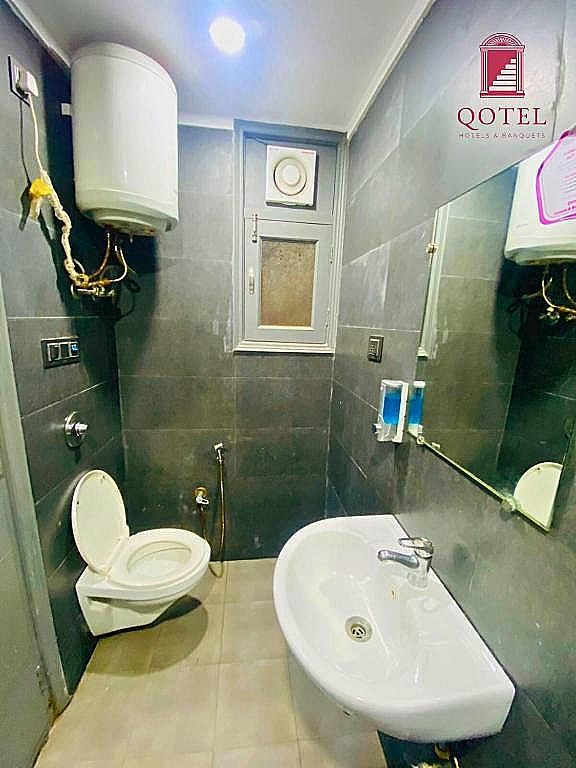 Qotel Express Rama Rohini Sector 24 Deluxe Room 10