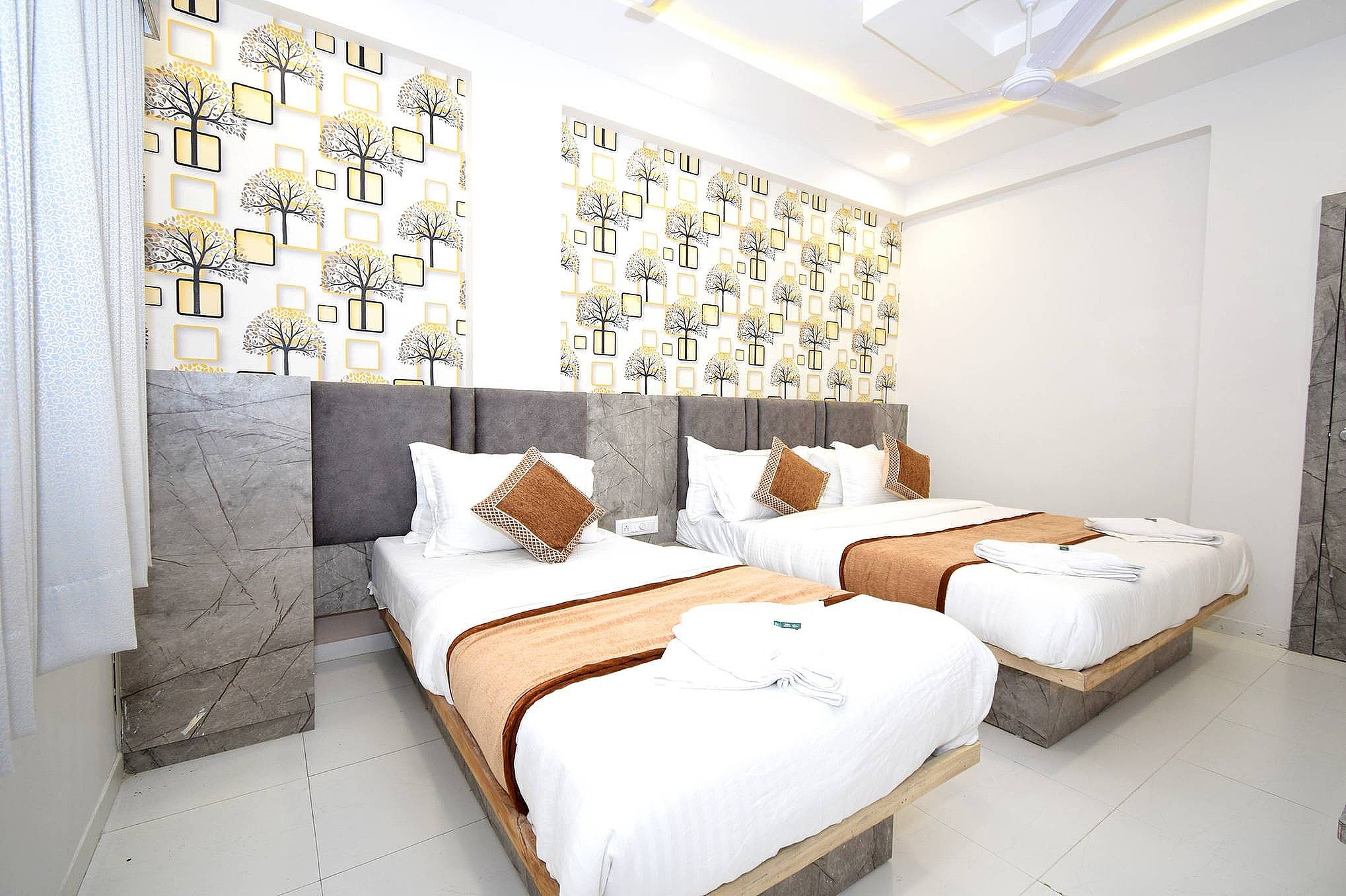 Deluxe Three Bed AC Room