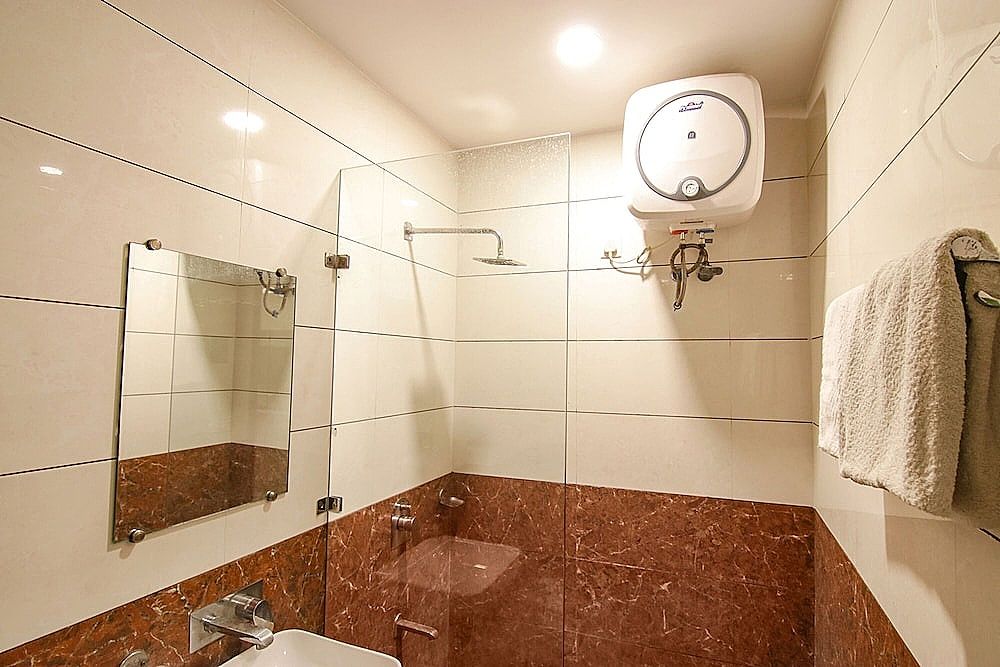 FabHotel Rosewood Inn Deluxe Room 3