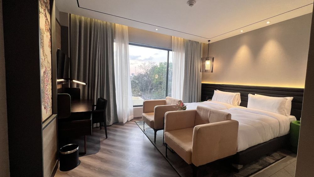 Ramada Encore By Wyndham Bareilly Civil Lines Deluxe Room, 2 Twin Beds 8