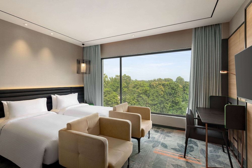 Ramada Encore By Wyndham Bareilly Civil Lines Deluxe Room, 2 Twin Beds