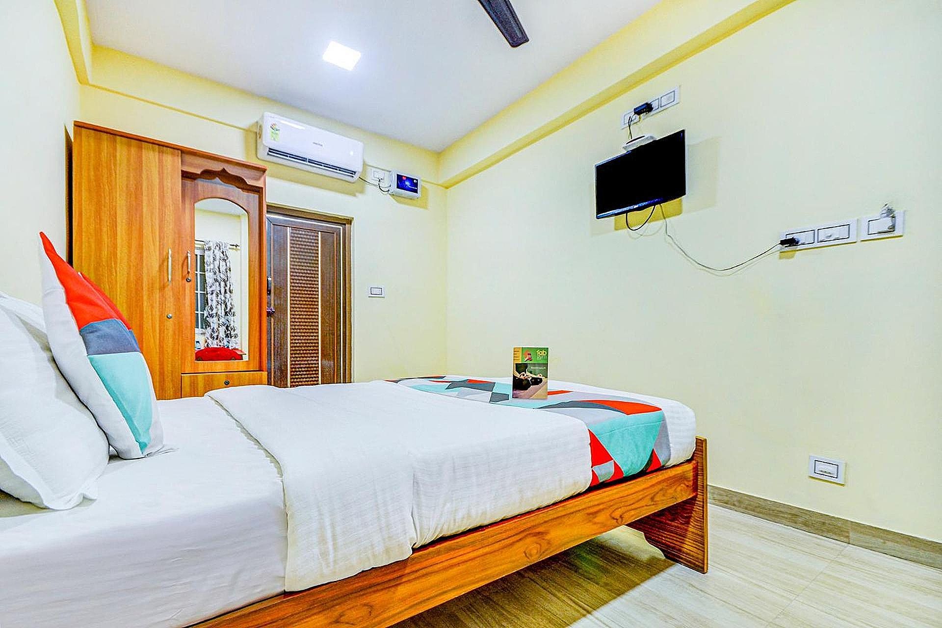 Fabexpress Ragu Residency Deluxe Room 7