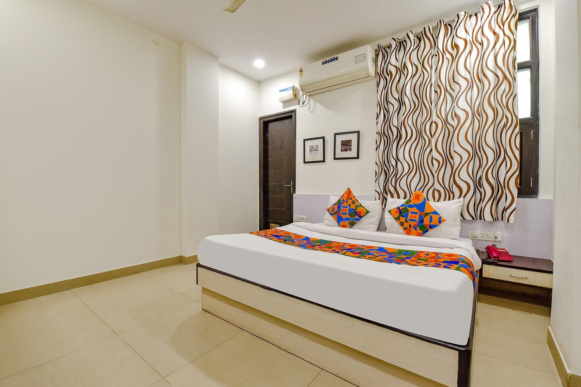 Via Rushank Residency Deluxe Room